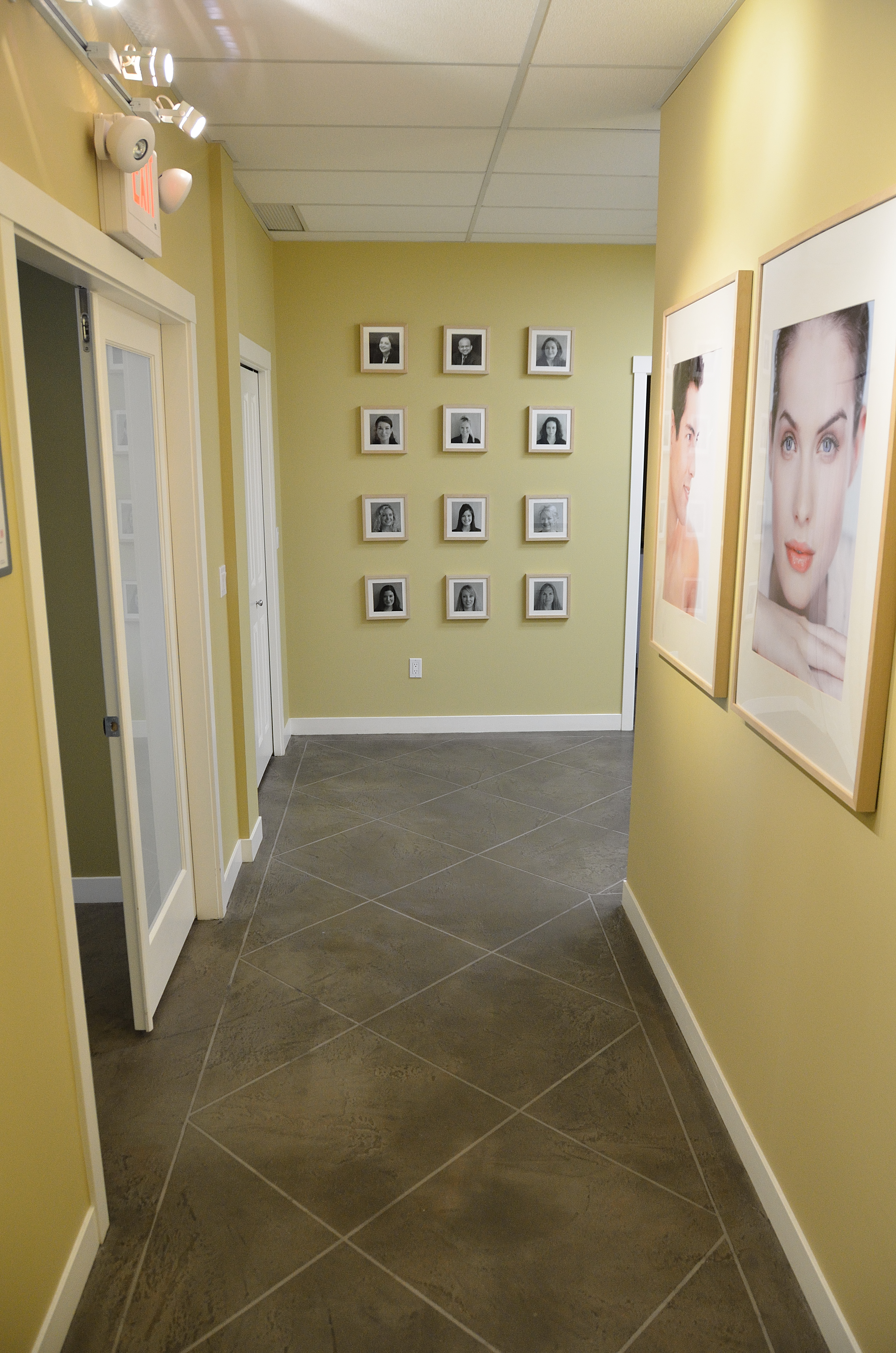 Commercial clinic hallway with diagonal tile pattern flooring