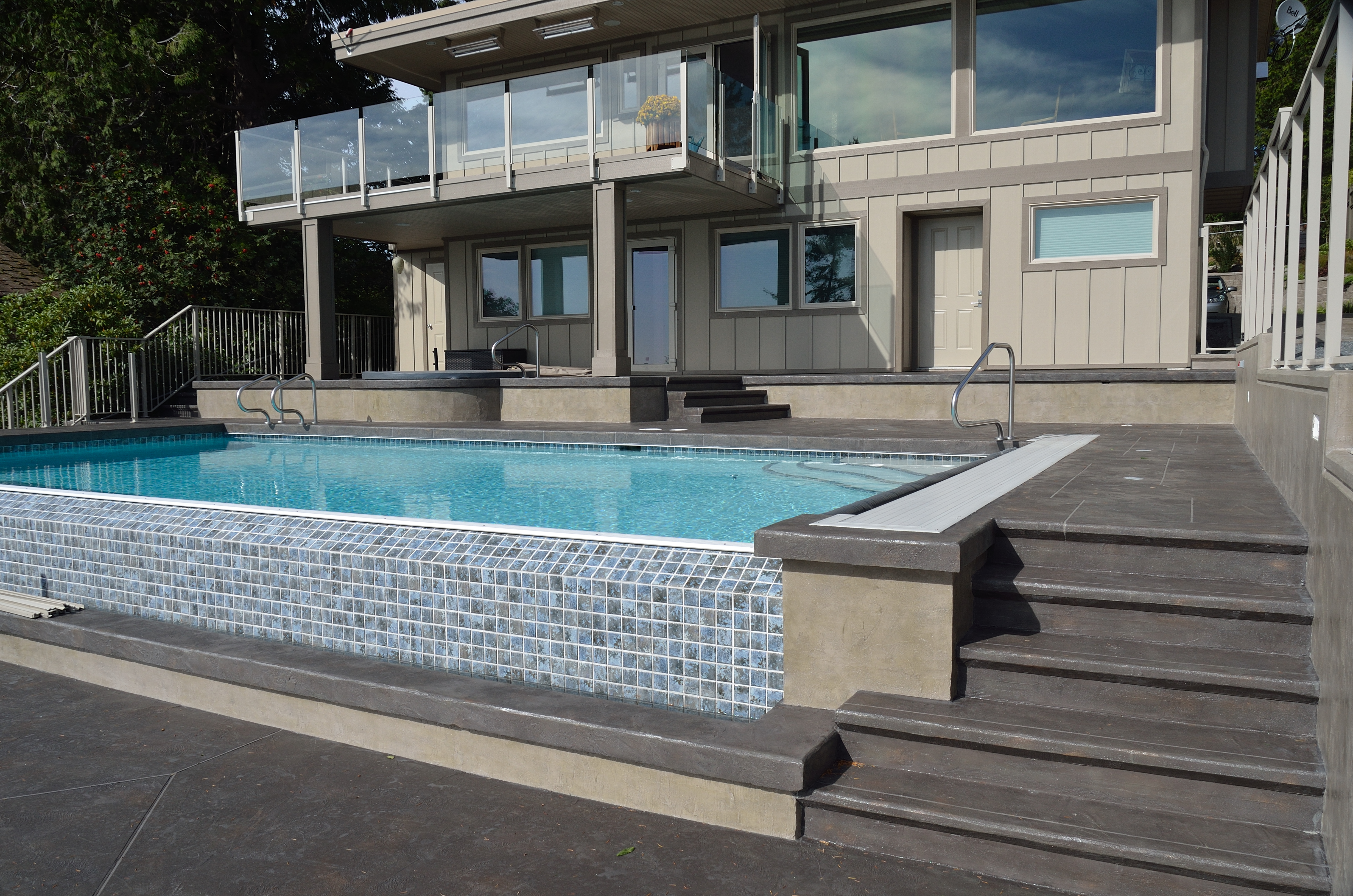 Residential pool area with StoneCraft deck surfacing